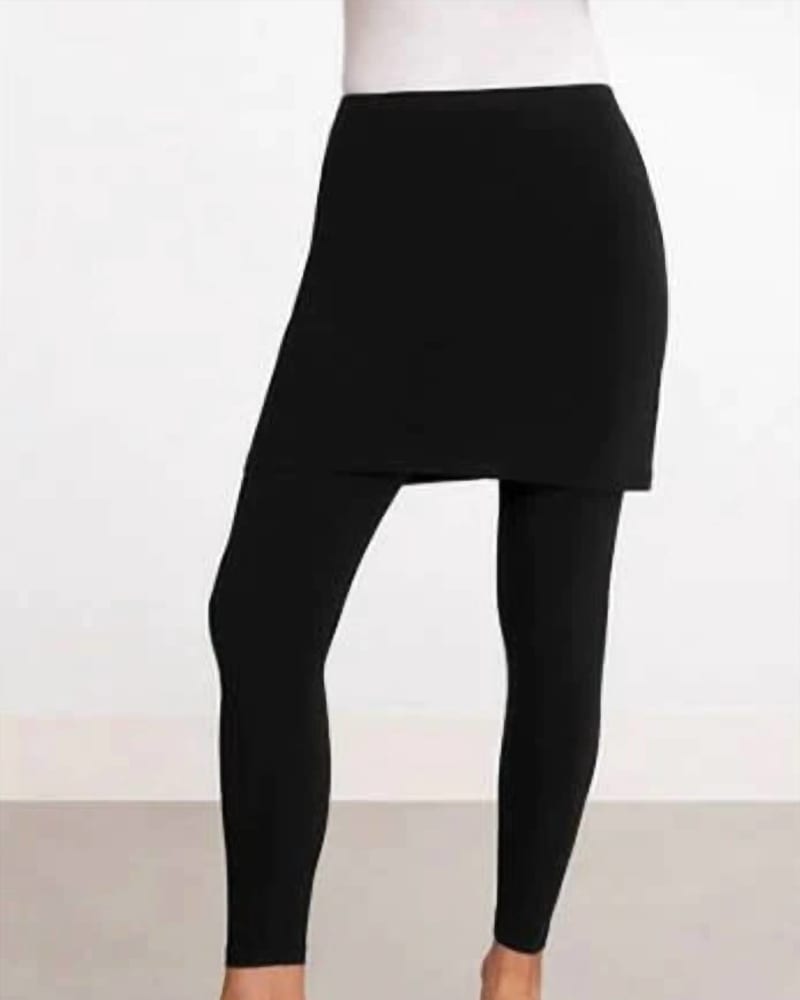 Front of a model wearing a size 12 Mini Skirt In Black in Black by Sympli. | dia_product_style_image_id:358825